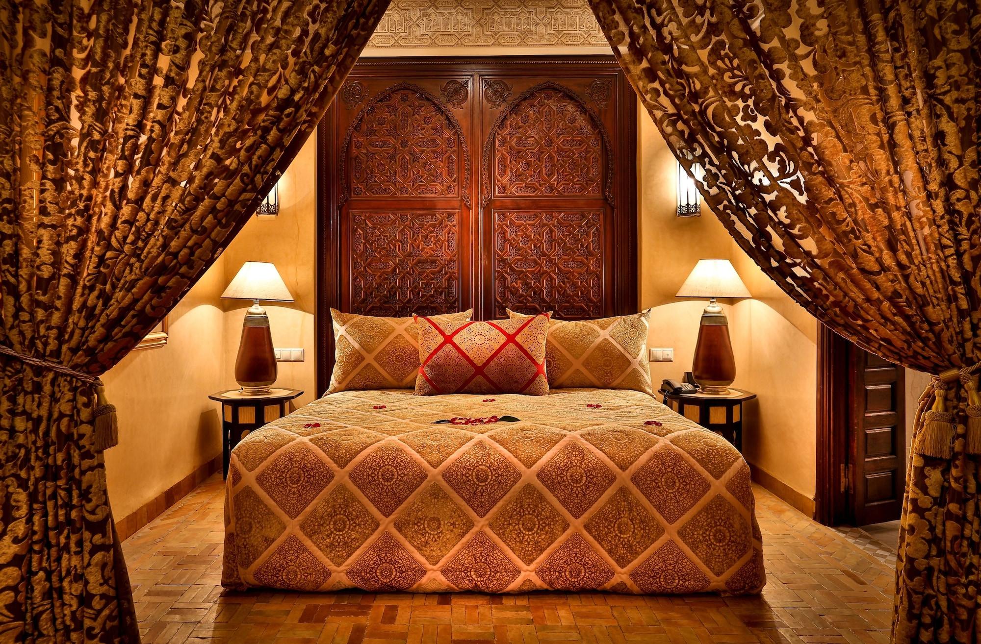 Riad Kniza Marrakesh Bagian luar foto A bedroom at the hotel