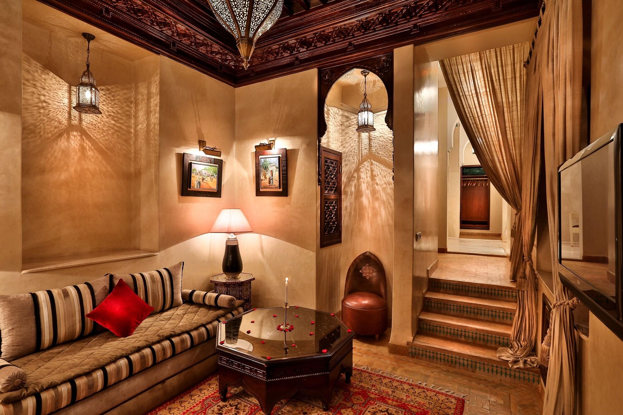 Riad Kniza Marrakesh Bagian luar foto Interior of a Moroccan house