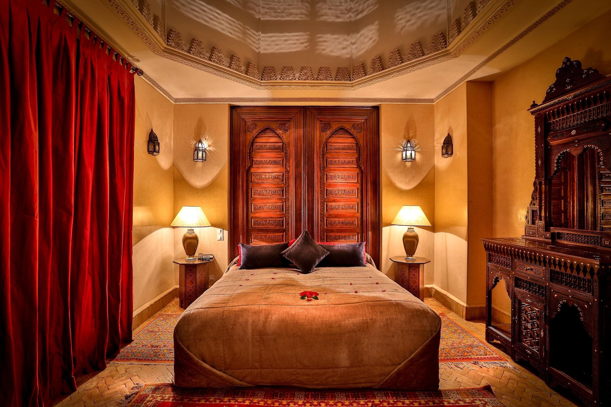 Riad Kniza Marrakesh Bagian luar foto A bedroom at the hotel
