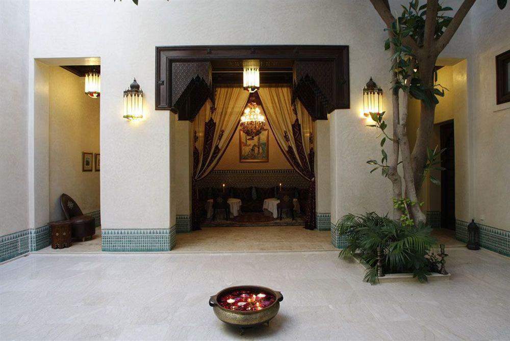 Riad Kniza Marrakesh Bagian luar foto The interior of the hotel