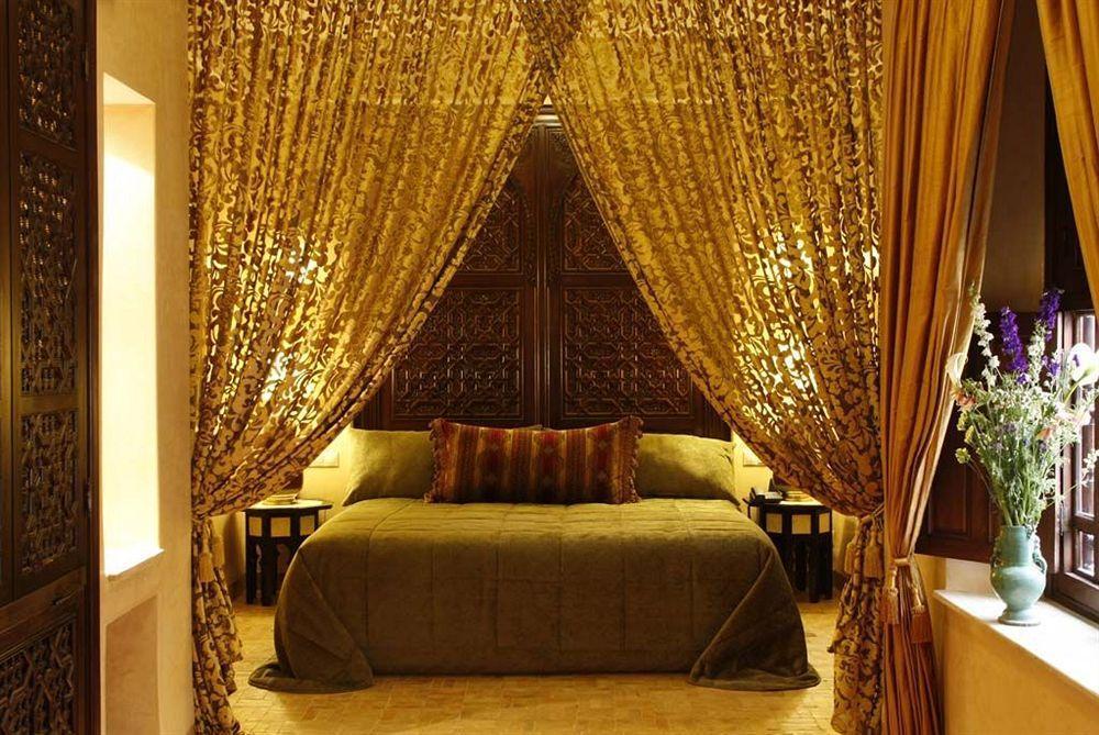 Riad Kniza Marrakesh Bagian luar foto A bedroom at the Taj Mahal Palace