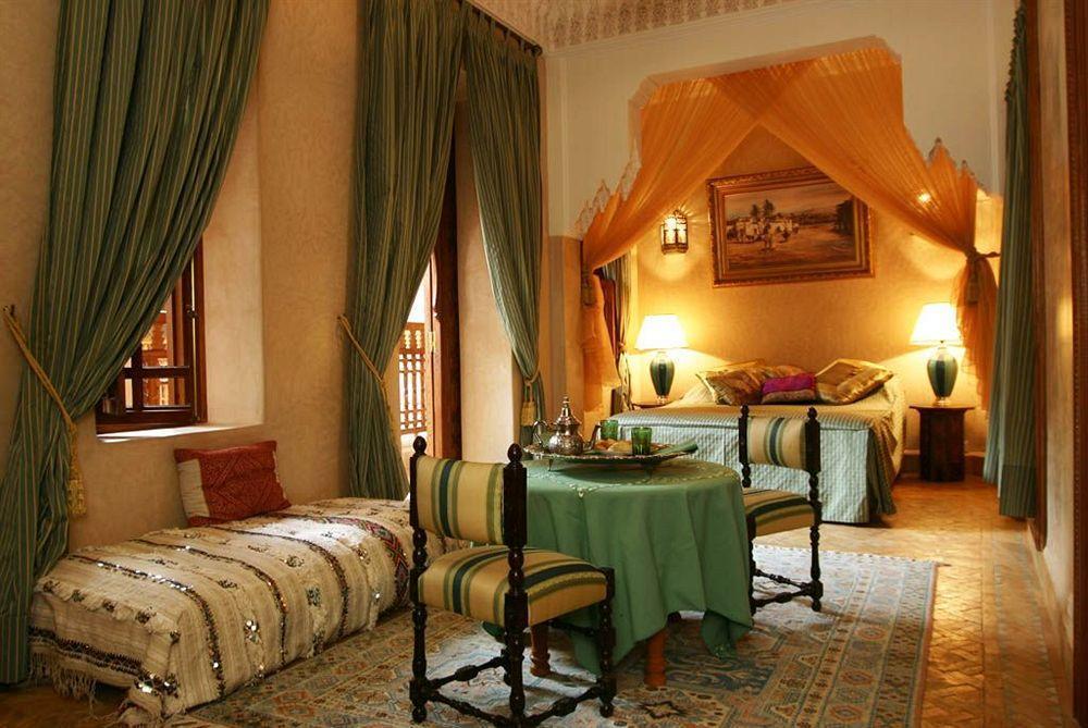 Riad Kniza Marrakesh Bagian luar foto A suite at the hotel