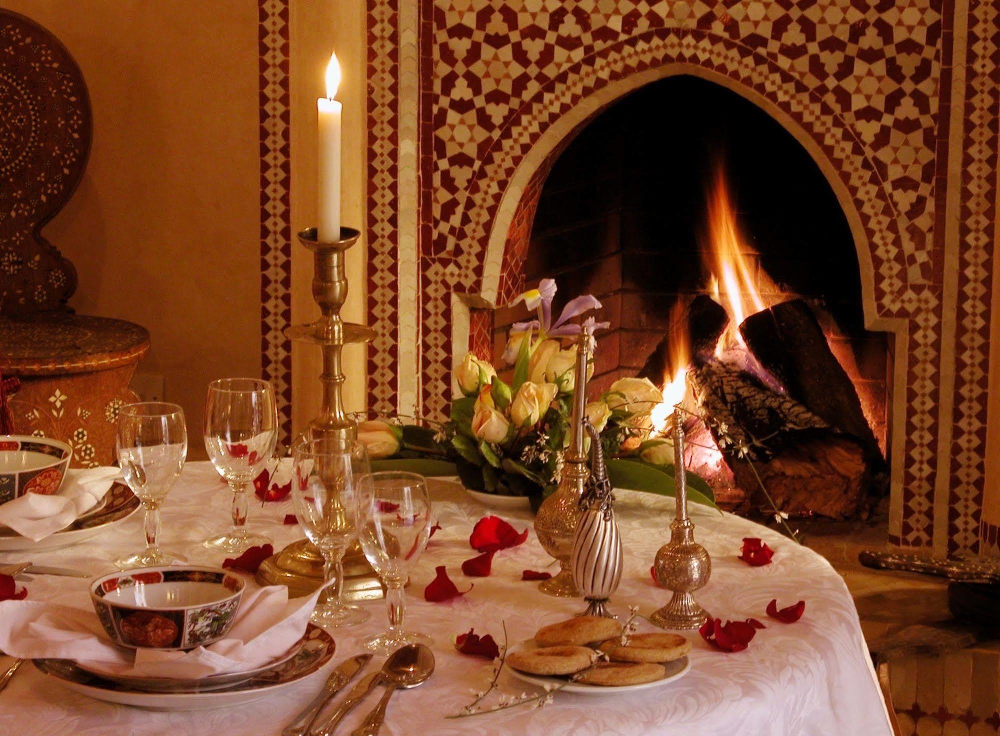Riad Kniza Marrakesh Bagian luar foto A Moroccan fireplace